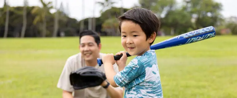 son and dad at the park