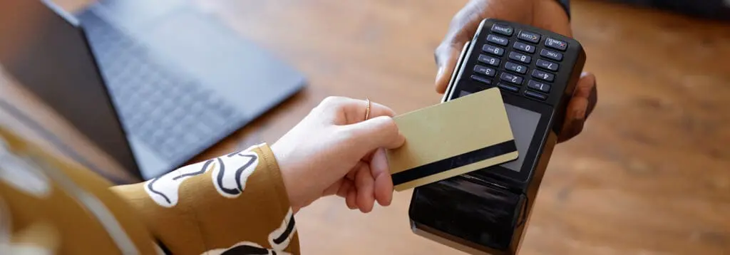 woman paying with card