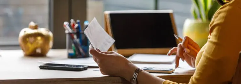 woman doing her taxes at home