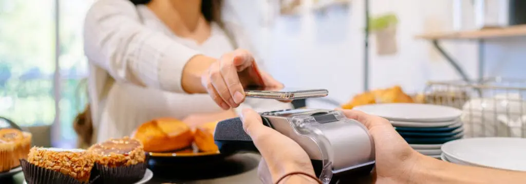 women using digital wallet to pay